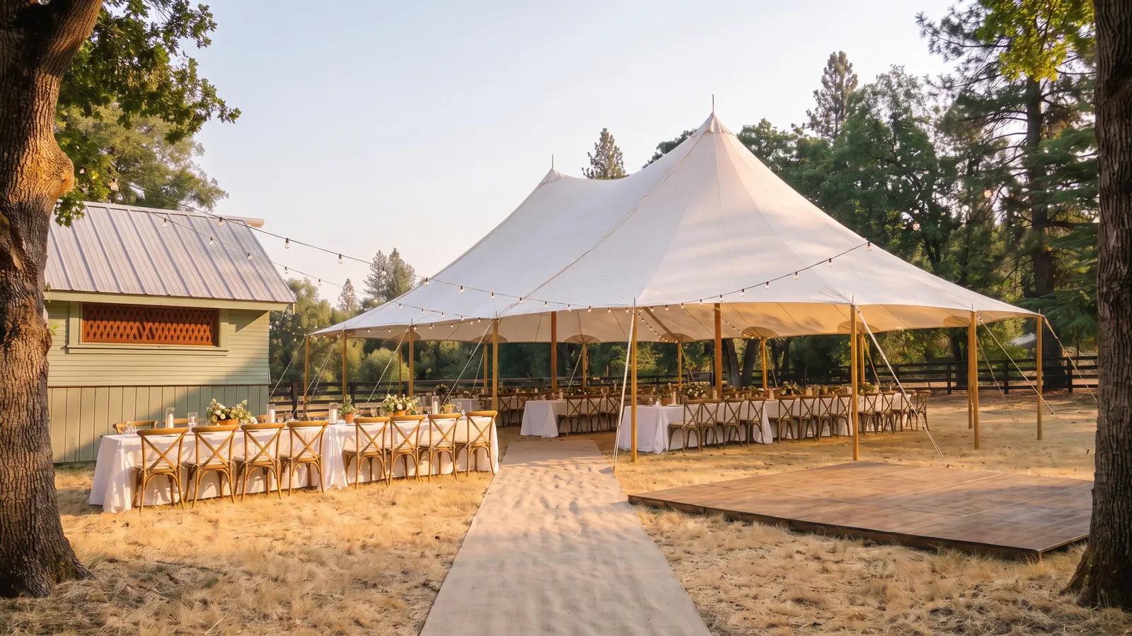 The lawn from one fixed viewpoint, linen, florals and string lights hung
